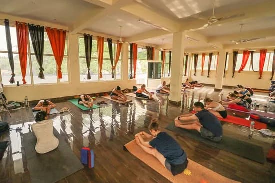 Deep Yoga retreat in Rishikesh — moment 2 from a past cohort on the banks of the Ganges